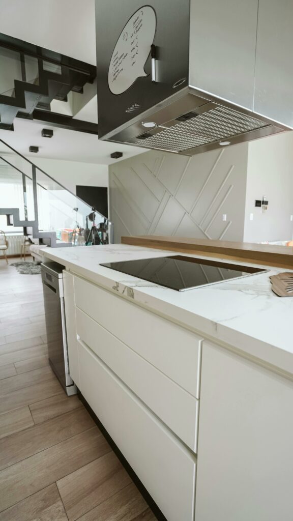 Chic modern kitchen with minimalist design, sleek appliances, and clean lines.